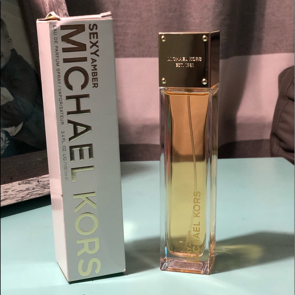 3.4 FL Oz bottle of Michael Kors Sexy Amber